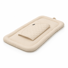 Side view of the beige Pawbella pet stroller plush cushion set with matching cover