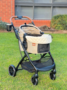 Front angle of the Pawbella Ultimate Pet Stroller with beige plush cushion set